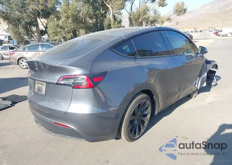 2023 Tesla Model Y Awd/Long Range Dual Motor All-Wheel Drive from USA, damaged, VIN 7SAYGAEE4PF609339